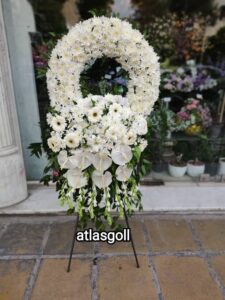 عکس تاج گل حلقه ای از گلفروشی اطلس گل در شیراز ، با بهترین کیفیت گل ها و متریال ساخت تاج گل و حلقه گل. چگونه از تاج گل مراقبت کنیم.